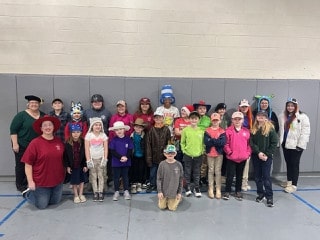 Mayflower students and teachers gathered for a school photograph
